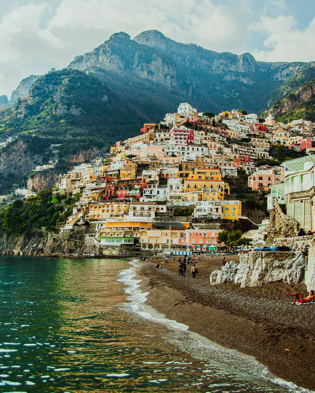 Aerial view of Positano beach and cliffside houses, Amalfi Coast, Italy